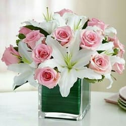 The Prestigious Rose - Radiant White Lilies and pink Roses. $65