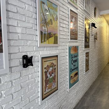 Pzza& - Wall of posters. All related to ingredients of pizza. - Pizza Near Me - Boca Raton, Florida Pzza& - Wall of posters. All related to ingredients of pizza. - Pizza Near Me - Boca Raton, Florida