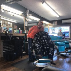 Lonestar Barbershop - April and client and Alisha in the far back.