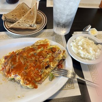 Blue Star Grill - Country omelette, grits, and whole wheat toast. - Burgers Near Me - High Springs, Florida Blue Star Grill - Country omelette, grits, and whole wheat toast. - Burgers Near Me - High Springs, Florida