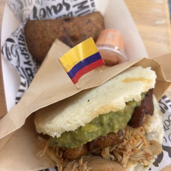 Union Square Night Market - ehbra authentic colombian food - braised chicken arepa; porkbelly & sweet plantain empanada - Public Markets Near Me - New York, New York Union Square Night Market - ehbra authentic colombian food - braised chicken arepa; porkbelly & sweet plantain empanada - Public Markets Near Me - New York, New York