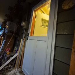 Iron Oak Innovations - The after picture of installation of storm door good fit