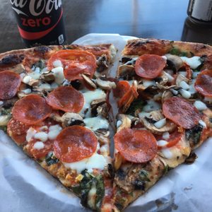 Photo of Boston's North End Pizza Bakery - Kailua, HI, United States. Big Red w/mushrooms and pepperoni