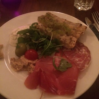 The Gotham Café - Italian antipasti platter: cheese, bread with olive oil, prosciutto and salami - American Near Me - Dublin, D The Gotham Café - Italian antipasti platter: cheese, bread with olive oil, prosciutto and salami - American Near Me - Dublin, D