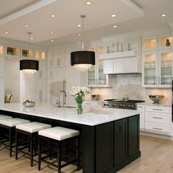 Accupro Renovations - White and Black With Cabinetry with white Quartz countertops, very modern kitchen done in 2021