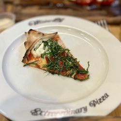Mister O1 Extraordinary Pizza Mansfield - Slice of the Star "destroyer" Luca. Once you see it, you can't unsee it.