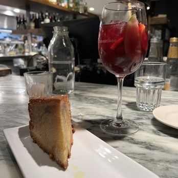 Barcelona Wine Bar - Olive oil cake and red sangria - Wine Bars Near Me - Houston, Texas Barcelona Wine Bar - Olive oil cake and red sangria - Wine Bars Near Me - Houston, Texas