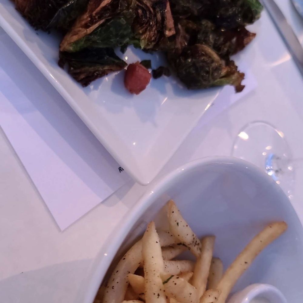 Red Tavern - Appetizers: crispy brussel sprouts and frites aka fries with truffle oil and garlic aioli - New American Near Me - Chico, California Red Tavern - Appetizers: crispy brussel sprouts and frites aka fries with truffle oil and garlic aioli - New American Near Me - Chico, California