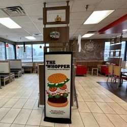 Burger King - Seating area with booths, tables, and chairs