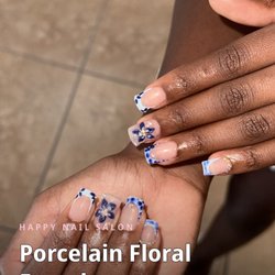 Happy Nail Salon - Porcelain floral French set by our techs. USF students enjoy a special discount with student ID; nearby middle & high school teachers get 10