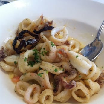 Las Brisas - Calamar con Limon y Ajo - Lightly fried squid, garlic lemon butter sauce, tomatos and ancho chiles. - Mexican Near Me - Laguna Beach, California