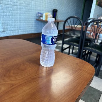 Pho Hang Restaurant - a bottle of water on a table - Vietnamese Near Me - Madison Heights, Michigan Pho Hang Restaurant - a bottle of water on a table - Vietnamese Near Me - Madison Heights, Michigan