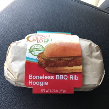 Speedway - a sandwich wrapped in foil on a car seat - Gas Stations Near Me - Raynham, Massachusetts