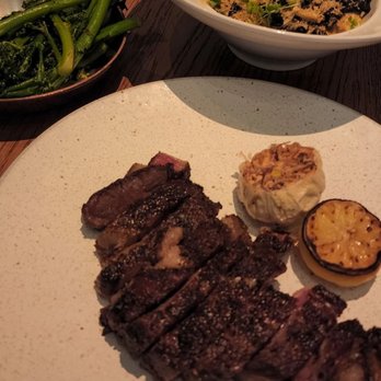 Marmo - 45 day aged steak with added bone marrow sauce, broccolini and squid ink pasta - Italian Near Me - Houston, Texas Marmo - 45 day aged steak with added bone marrow sauce, broccolini and squid ink pasta - Italian Near Me - Houston, Texas