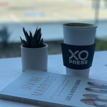 XO Press - a cup of coffee and a book on a table - Coffee & Tea Near Me - Southlake, Texas XO Press - a cup of coffee and a book on a table - Coffee & Tea Near Me - Southlake, Texas