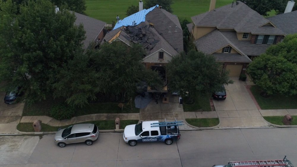 Slide of Einstein Roofing and Restoration