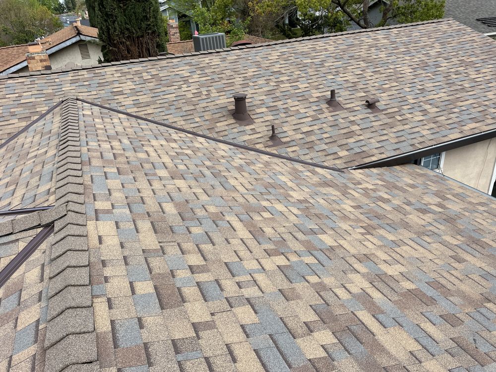 Slide of Triark Roofing