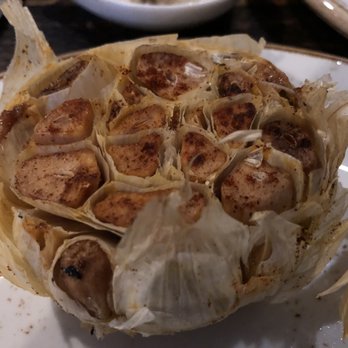 Jimmy P's Charred - Roasted garlic for your steak! - Steakhouses Near Me - Naples, Florida