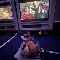 United Airlines - Late night ice cream with my daughter flying over the pacific