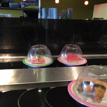 Sushi Revolution - The higher cost plating on some raw Tuna items. Tuna used to be on the yellow plate and the seared was on pink. - Sushi Bars Near Me - Tacoma, Washington Sushi Revolution - The higher cost plating on some raw Tuna items. Tuna used to be on the yellow plate and the seared was on pink. - Sushi Bars Near Me - Tacoma, Washington