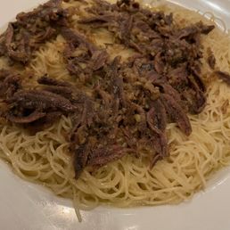 Anchovie with garlic sauce over angel hair Anchovie with garlic sauce over angel hair