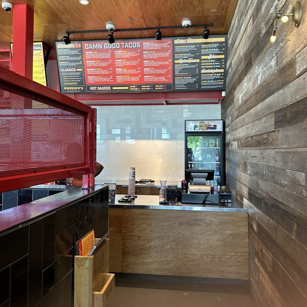 Torchy's Tacos - The place was not crowded. It had just opened for lunch. Several people were outside eating. - Tex-Mex Near Me - Houston, Texas Torchy's Tacos - The place was not crowded. It had just opened for lunch. Several people were outside eating. - Tex-Mex Near Me - Houston, Texas