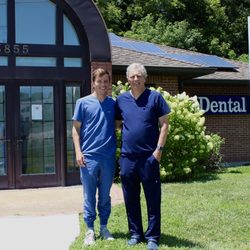 Tosie Dental - Dr. Richard Tosie (founder) and his son, Dr. Kyle Tosie (general dentist) outside of the practice.
