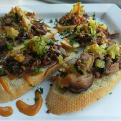 Chi-ago's Phat Smoke - Brisket Crustini's Appitizer used at a catered event. Ask us to cater and you too could have these.
