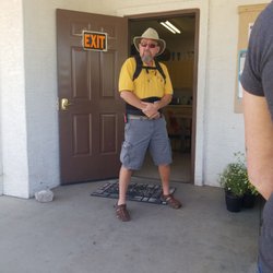 Smiling Dog Landscapes - The owner of Smiling Dog Landscaping with his crew are doing irrigation installation on a project in Mesa.