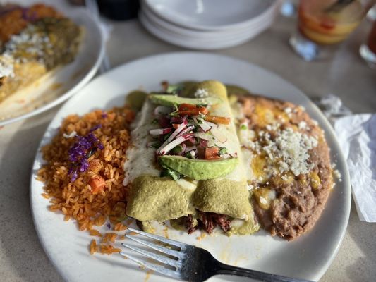 Photo of Miguel's Cocina - San Diego, CA, US. a plate of mexican food