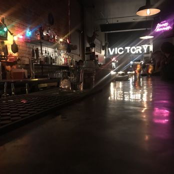 Saint Franks - a view of a bar with neon lights - Hot Dogs Near Me - Victoria, British Columbia