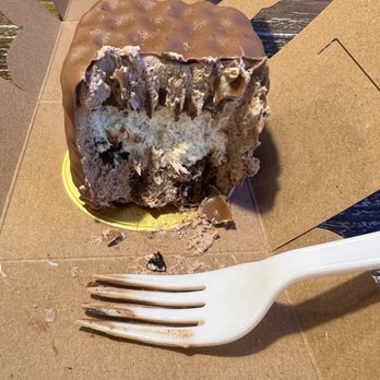 Rendezvous International Café - Oreo cheesecake on top of brownie, covered in chocolate mousse & dipped in chocolate - Coffee & Tea Near Me - Abingdon, Virginia