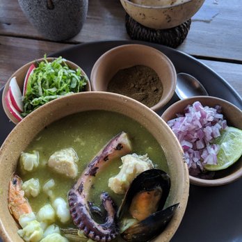 Punta Corcho - Closer view of Pozole Verde con Mariscos. Green Pozole with a pumpkin seed base boullion and a mix of seafood. - Seafood Near Me - Benito Juárez, ROO