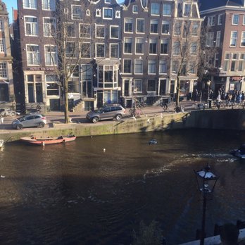 De Amsterdamse grachten - Amsterdam canals in the morning - Local Flavor Near Me