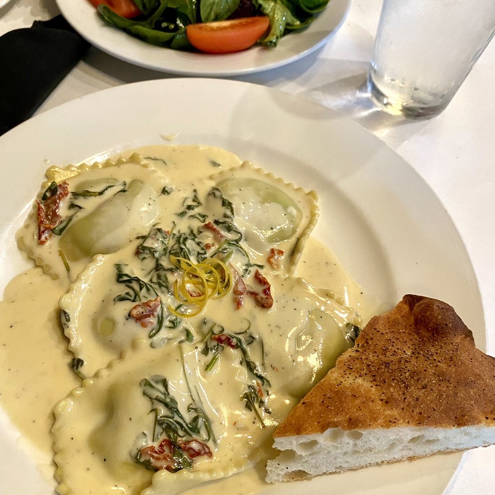 Café Roma - Chef Special: Pea Ravioli with a lemon butter cream, sun dried tomatoes, and wilted arugula Salad: Roma Insalata with spinach - Italian Near Me - Cleveland, Tennessee Café Roma - Chef Special: Pea Ravioli with a lemon butter cream, sun dried tomatoes, and wilted arugula Salad: Roma Insalata with spinach - Italian Near Me - Cleveland, Tennessee