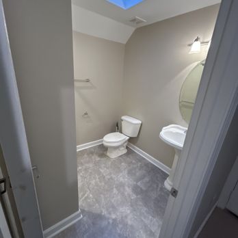 NSJC Management - After picture of the upstairs bathroom. Repainted, added new floors and fixtures to update this bathroom to be a beautiful guest bathroom. - General Contractors Near Me NSJC Management - After picture of the upstairs bathroom. Repainted, added new floors and fixtures to update this bathroom to be a beautiful guest bathroom. - General Contractors Near Me