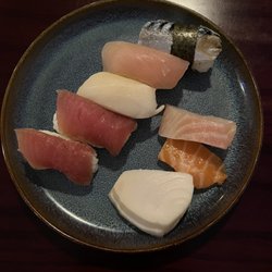 Orchid Japanese Restaurant - Top: Tuna (2), White tuna, Yellowtail & Mackerel Negiri Bottom: White tuna, Salmon & Red Snapper Sashimi