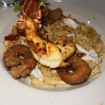 Papi Cuisine - Seafood pasta ( lobster, shrimp and crab meat ) - Cocktail Bars Near Me - Baltimore, Maryland Papi Cuisine - Seafood pasta ( lobster, shrimp and crab meat ) - Cocktail Bars Near Me - Baltimore, Maryland