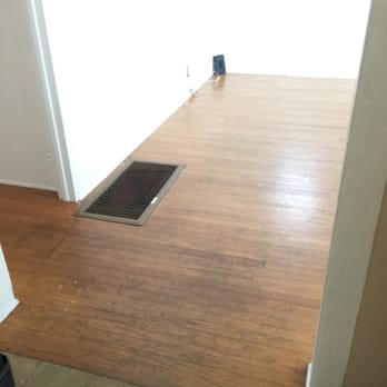 Diaz Hardwood Floor - Living room before...unsightly grate, heavily stained floors... - Flooring Near Me - Lawndale, California Diaz Hardwood Floor - Living room before...unsightly grate, heavily stained floors... - Flooring Near Me - Lawndale, California