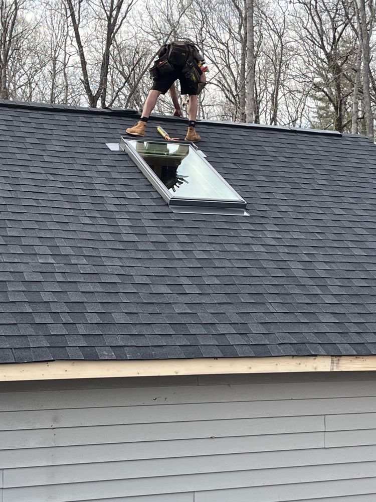 Slide of Wuilson’s Roofing