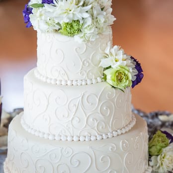 The Cakery - My wedding cake. Chose a design from their books and made some adjustments. The exterior is white chocolate fondant - Custom Cakes Near Me - Burlingame, California