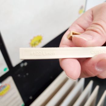 Tile Depot - David holding a grout stick sample to the chosen tile. This one is called Linen. - Flooring Near Me - South El Monte, California Tile Depot - David holding a grout stick sample to the chosen tile. This one is called Linen. - Flooring Near Me - South El Monte, California