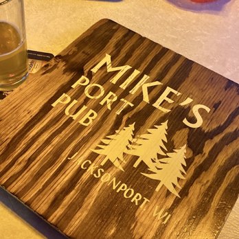 Mike's Port Pub - a glass of beer and a cutting board - American Near Me - Jacksonport, Wisconsin Mike's Port Pub - a glass of beer and a cutting board - American Near Me - Jacksonport, Wisconsin