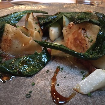 The Progress - Sauerkraut pierogi with smoked jowl bacon, ramps and black butter apple sauce - New American Near Me - San Francisco, California