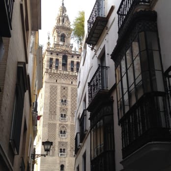 Cathedral de Sevilla - Slender peak from maze-like streets - Churches Near Me - Seville, SE Cathedral de Sevilla - Slender peak from maze-like streets - Churches Near Me - Seville, SE