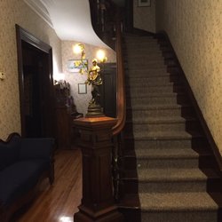 Carriage House Inn - Stairway leading to rooms.