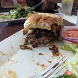 Nayeli’s Pizza - My Cowboy burger on its way to being demolished