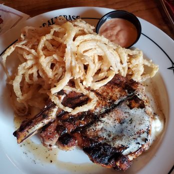 Saltgrass Steak House - Double boned pork chop with fried onions - Steakhouses Near Me - Rogers, Arkansas Saltgrass Steak House - Double boned pork chop with fried onions - Steakhouses Near Me - Rogers, Arkansas