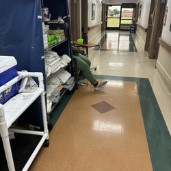 Green Valley Healthcare & Rehabilitation Center - Aide watching movies on iPad
