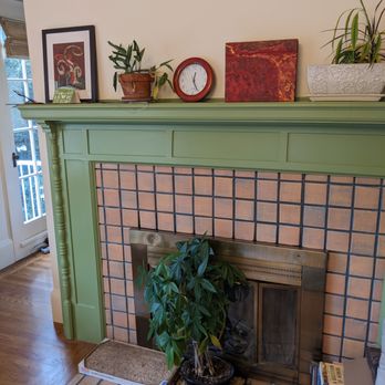 Ysabel Lola Interiors - Green color around fireplace - Interior Design Near Me